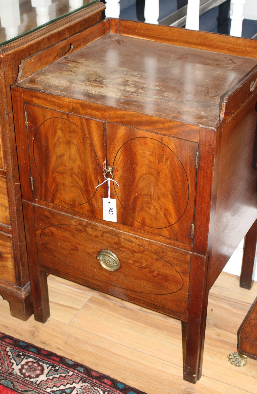 A George III mahogany tray top commode W.56cm